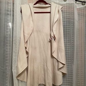 Cream sleeveless sweater